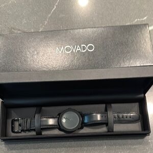 Movado BOLD All Black Dial with Rhinestone accent and Leather Band.